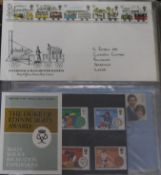 Two stamp albums and First Day covers