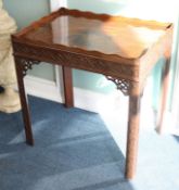 A Chippendale style blind fret-carved mahogany silver table and a Georgian style mahogany side