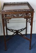 A Georgian style fret-carved mahogany silver table, W.46cm