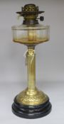 A Victorian brass and cut glass oil lamp