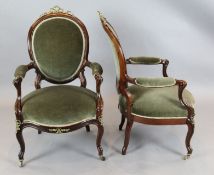 A pair of Victorian rosewood armchairs, with brass ribbon crests, on cabriole legs and wooden