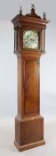 John Day of Wakefield. A George III oak eight day longcase clock, the 12 inch square brass dial with