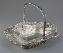 A Victorian pierced and embossed silver shaped rectangular fruit basket by Atkin Brothers, with