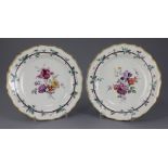 A pair of Worcester Sheridan pattern plates, c.1770, painted in the London studio of James Giles