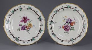 A pair of Worcester Sheridan pattern plates, c.1770, painted in the London studio of James Giles