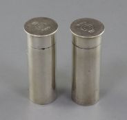 A pair of 1930's novelty silver condiments modelled as shotgun cartridges, by Mappin & Webb,