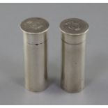 A pair of 1930's novelty silver condiments modelled as shotgun cartridges, by Mappin & Webb,