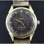 A gentleman's 1960's gold plated and steel Omega Constellation automatic wrist watch with black