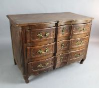 An 18th century French walnut serpentine commode, fitted three carved long drawers, on scroll