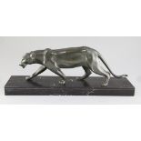 Henri Molins. An Art Deco green patinated bronze model of a prowling panther, on black marble