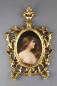 A Berlin KPM oval porcelain plaque, late 19th century, head and shoulder portrait of a young maiden,