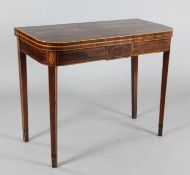 A George III boxwood strung inlaid mahogany tea table, with folding D shape top, on square tapered