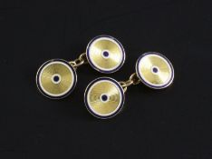 A pair of early 20th century French gold and two colour enamel "target" cufflinks by Lacloche
