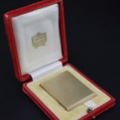 A 1960's Cartier engine turned ribbed 9ct gold matchbook case, hallmarks for Jacques Cartier,