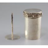 A 1970's silver cylindrical cigarette canister and cover by Graham Watling of Lacock, with sphere