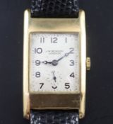 A gentleman's 1930's 9ct gold J. W. Benson manual wind wrist watch, with rectangular Arabic dial and