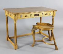 A Stewart Linford HMS Victory 'Admiral's Collection' oak and copper chart table with matching saddle