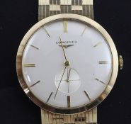 A gentleman's early 1960's 9ct gold Longines manual wind wrist watch, with baton numerals and