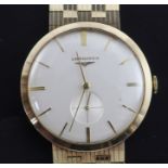 A gentleman's early 1960's 9ct gold Longines manual wind wrist watch, with baton numerals and