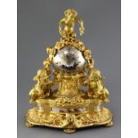 A mid 19th century French ormolu and silvered bronze mantel clock, modelled as a sphere surrounded