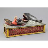 A cast iron 'Jonah and the whale' mechanical money bank, by Shepard Hardware, c.1890, with