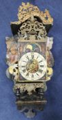 A 19th century Dutch painted metal and wood wall clock, with alarum dial and date aperture, height