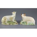 A Staffordshire creamware figure of a recumbent ram and a similar pearlware figure of a recumbent