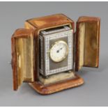 An early 20th century continental silver and enamel miniature carriage timepiece, with leather