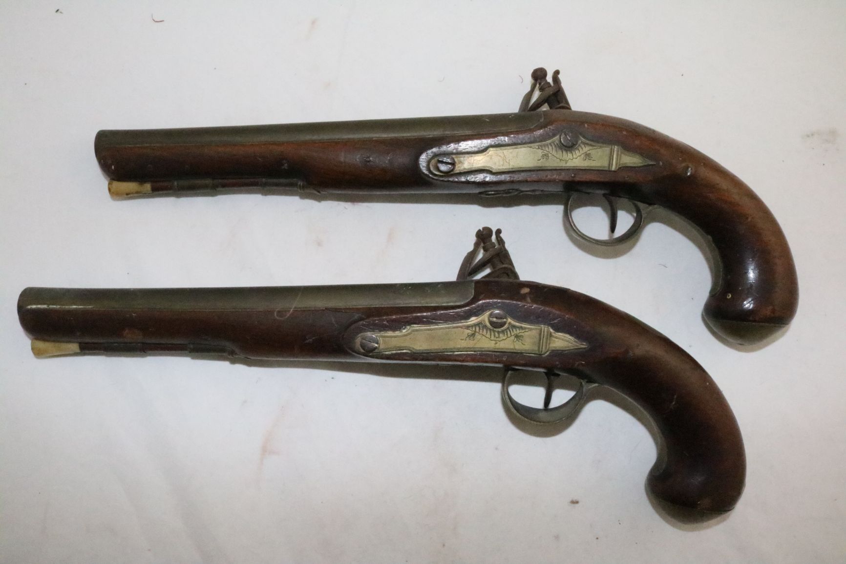 A pair of early 19th century flintlock holster pistols, signed Weston, Lewes, 15in. - Image 4 of 4