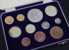 A South Africa 1958 eleven coin proof set, to include gold £1 and half pound coins, (some tarnish).