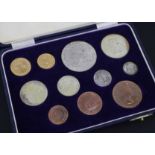 A South Africa 1958 eleven coin proof set, to include gold £1 and half pound coins, (some tarnish).