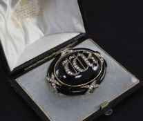 A Victorian gold, black enamel and rose cut diamond mourning pendant brooch in Hunt & Roskell fitted
