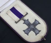 A Military Cross medal to Lieutenant Francis Rennie Daniel, with a Gordon Highlanders badge,