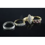 Four 18ct gold gem set rings including diamond cluster, ruby & diamond and a diamond full