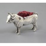 An Edwardian novelty silver pin cushion modelled as a bull by Adie & Lovekin, Birmingham, 1907, 2.