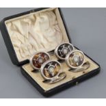 A George V cased set of four silver and tortoiseshell pique menu holders by William Comyns & Sons