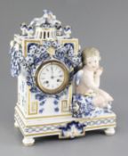 A Meissen figural mantel clock, late 19th century, of architectural form with the seated figure of