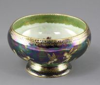 Daisy Makeig-Jones. A Wedgwood 'Leapfrogging Elves' pattern Black Fairyland lustre Empire bowl, gilt