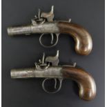 A pair of early 19th century boxlock percussion cap pistols, with cylindrical barrels, converted