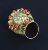 A 14ct gold, split coral and turquoise set dress ring, modelled as the head of a lion, size M.