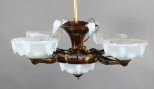 An early 20th century French coppered metal light fitting, with opalescent glass shades, drop 2ft,