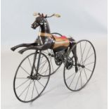 A 19th century French wrought and cast iron velocipede modelled as a racing horse, Overall length