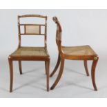 A set of eight Regency rosewood dining chairs, with ropetwist cresting rails, caned spars and
