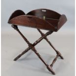 A George III mahogany butler's tray and folding stand, tray 3ft 6in. x 2ft 8in.