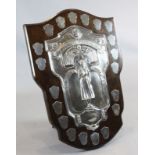 A large George V 1930's silver mounted oak presentation shield "The Ada Florence Cuthbert Memorial