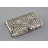 A late 19th/early 20th century Russian 84 zolotnik silver cigarette case, with stylised reeded