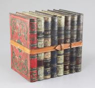 A Huntley & Palmer novelty biscuit tin, late 19th century, modelled as eight leather bound books,