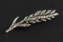 A Victorian gold, silver and diamond foliate spray brooch, once part of a tiara and set with old