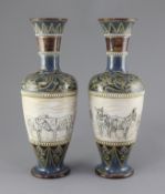 Hannah Barlow for Doulton Lambeth. A pair of sgraffito vases, circa 1895, each decorated to a