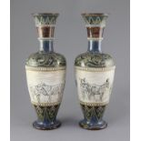 Hannah Barlow for Doulton Lambeth. A pair of sgraffito vases, circa 1895, each decorated to a